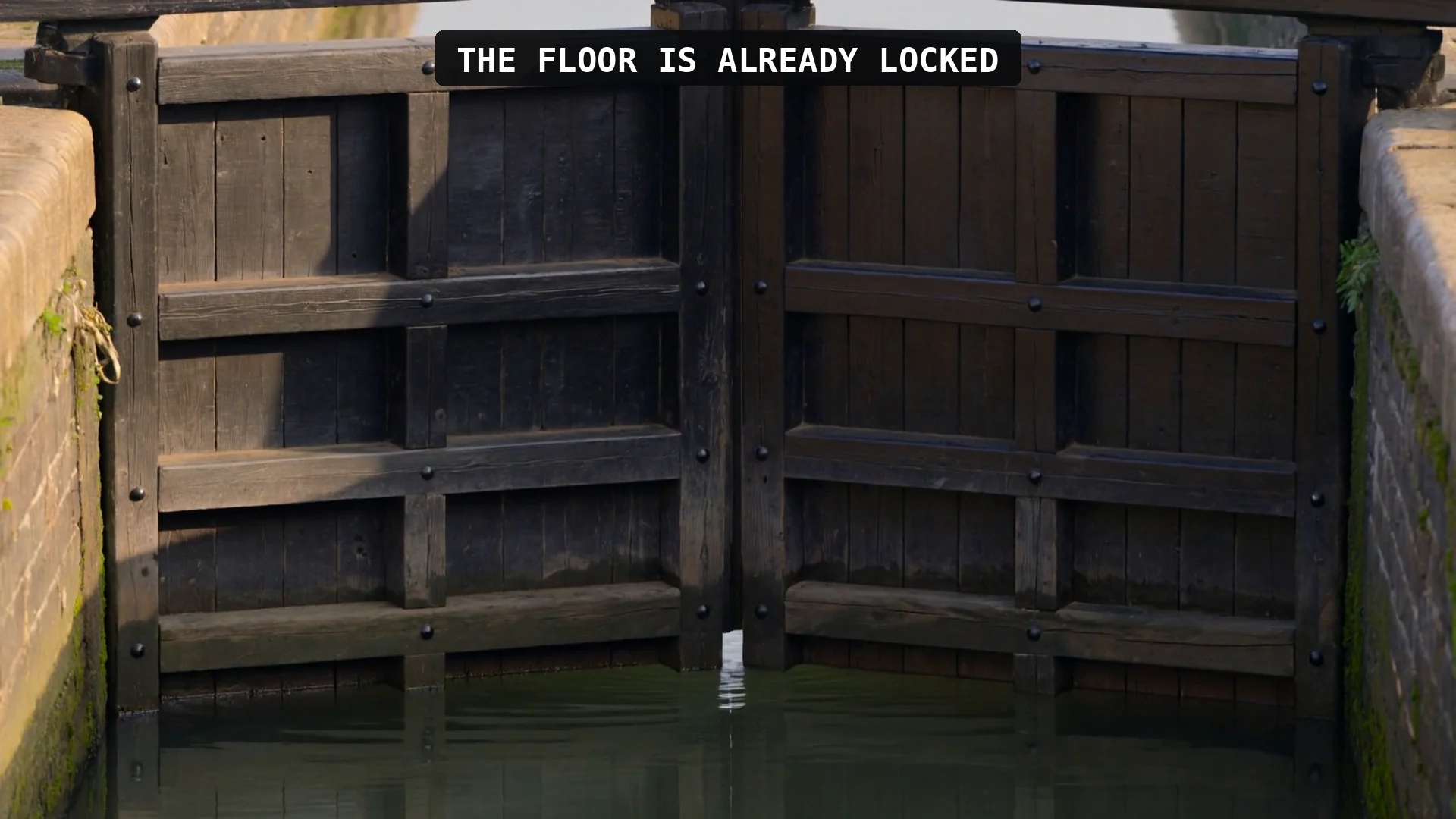 Canal lock gates closing: by the time you hit the target, the floor is already locked